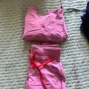 FIGS light pink with red tie, XS Catarina top with XXS Zamora bottoms